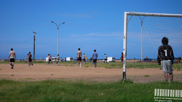 young_uruguayans_playing_football_in_ciudad_vieja_montevideo_uruguay